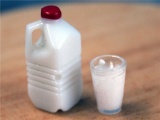 Set; melkcontainer met glas